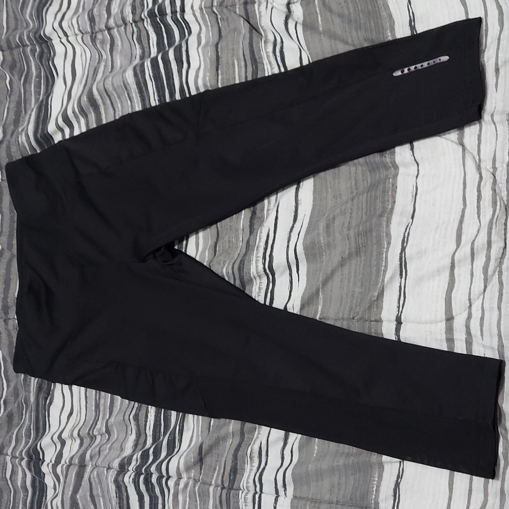 Womans black spandex  workout leggings mesh sides with 2 pockets